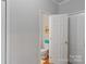 Conveniently located powder room with toilet at 7019 Walnut Ridge Ct, Charlotte, NC 28217