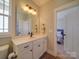 Elegant bathroom with white vanity and a mirror at 721 Red Spruce Dr, York, SC 29745