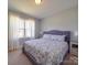 Bright bedroom with large window and carpeted floor at 721 Red Spruce Dr, York, SC 29745