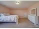 Charming bedroom with pink walls and a double bed at 721 Red Spruce Dr, York, SC 29745