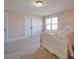 Spacious bedroom with pink walls and double doors at 721 Red Spruce Dr, York, SC 29745