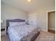 Spacious bedroom with double doors and carpeted floor at 721 Red Spruce Dr, York, SC 29745