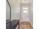 Bright entryway with tile flooring, a dark wood console table, and a mirror at 721 Red Spruce Dr, York, SC 29745