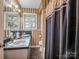 Bathroom with double vanity and shower at 7392 Reeps Grove Church Rd, Vale, NC 28168