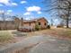 Brick ranch home with a deck and spacious driveway at 7392 Reeps Grove Church Rd, Vale, NC 28168