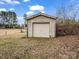 Detached single-car garage with weathered exterior at 7392 Reeps Grove Church Rd, Vale, NC 28168