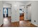 Hallway with hardwood floors and access to bedrooms at 7392 Reeps Grove Church Rd, Vale, NC 28168