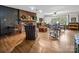 Living room featuring hardwood floors, fireplace, and large windows at 7392 Reeps Grove Church Rd, Vale, NC 28168