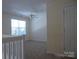 Bedroom with neutral carpet and ceiling fan at 8620 Robinson Forest Dr, Charlotte, NC 28277