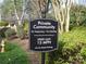 A private community sign displays rules about speed limits and parking at 8620 Robinson Forest Dr, Charlotte, NC 28277