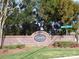 A brick community sign announces Tyler Woods on a sunny day at 8620 Robinson Forest Dr, Charlotte, NC 28277