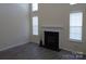 Bright living room with modern floors and white fireplace at 8620 Robinson Forest Dr, Charlotte, NC 28277