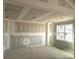 Unfinished bedroom with a large window at 9062 Mccray Farms Dr, Hickory, NC 28601