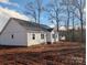 White sided home with gray roof and landscaping at 9062 Mccray Farms Dr, Hickory, NC 28601