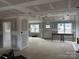 Unfinished living room with two windows and a door at 9062 Mccray Farms Dr, Hickory, NC 28601