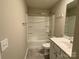 Clean bathroom with tub, shower, and single vanity at 9446 Avery Lilac Ln, Fort Mill, SC 29707