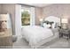 Charming bedroom with a white headboard, soft bedding, and natural light at 9957 Cask Way, Huntersville, NC 28078