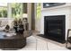 Modern fireplace with dark stone surround, located in living room at 9957 Cask Way, Huntersville, NC 28078