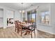 Dining area with sliding doors leading to a deck and a view of the backyard at 1037 Tobin Dr, Fort Mill, SC 29715