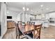 Spacious dining room with hardwood floors and a wooden table at 1037 Tobin Dr, Fort Mill, SC 29715