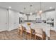 Modern kitchen with white cabinets, quartz countertops, and island at 1037 Tobin Dr, Fort Mill, SC 29715