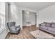 Inviting living area featuring wood floors, neutral colors and lots of sunlight at 1037 Tobin Dr, Fort Mill, SC 29715