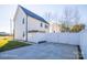 House exterior with driveway and white fence at 114 E 5Th Ave, Gastonia, NC 28052