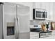 Stainless steel refrigerator and microwave in modern kitchen at 1140 Evergreen View Ln # 17, Charlotte, NC 28212