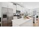 Stainless steel appliances and white cabinetry highlight this kitchen at 1140 Evergreen View Ln # 17, Charlotte, NC 28212