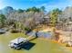 Aerial view showcasing lakefront home and dock at 1221 Brunson Rd, Fort Lawn, SC 29714