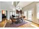 Bright dining room with hardwood floors and access to outdoor patio at 1221 Brunson Rd, Fort Lawn, SC 29714