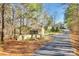 Long driveway leading to a house and detached shed at 1221 Brunson Rd, Fort Lawn, SC 29714