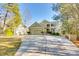 Two-story home with attached garage and circular driveway at 1221 Brunson Rd, Fort Lawn, SC 29714