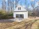 White detached garage with open door, offering extra storage at 124 Lyman Oak Ct, Fort Mill, SC 29715