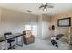 Home gym with weight bench, recliner, and desk at 129 Bald Cypress Ln, Mooresville, NC 28115