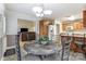 Breakfast nook with table and chairs, view of living room at 129 Bald Cypress Ln, Mooresville, NC 28115