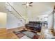 Bright living room with hardwood floors, view into dining area at 129 Bald Cypress Ln, Mooresville, NC 28115