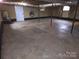 Unfinished basement with high ceilings and ample storage space at 1325 Eastview Ext, Shelby, NC 28152