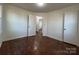 Bedroom with hardwood floors and access to another room at 1325 Eastview Ext, Shelby, NC 28152