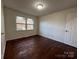 Spacious bedroom with hardwood floors and large windows at 1325 Eastview Ext, Shelby, NC 28152