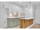 Modern basement kitchenette with green cabinets and quartz countertops at 13833 Jonathans Ridge Rd, Charlotte, NC 28227