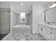 Elegant bathroom with soaking tub and marble floors at 13833 Jonathans Ridge Rd, Mint Hill, NC 28227