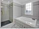 Bathroom with shower and soaking tub at 13833 Jonathans Ridge Rd, Mint Hill, NC 28227