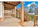 Brick patio with wooden stairs leading to deck at 13833 Jonathans Ridge Rd, Mint Hill, NC 28227