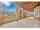 Large brick patio with stairs, under house deck at 13833 Jonathans Ridge Rd, Mint Hill, NC 28227