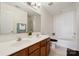 Bathroom boasts double vanity and bathtub at 1411 Ladora Dr, Charlotte, NC 28262