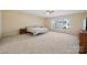 Bright bedroom featuring a large window and plush carpeting at 1411 Ladora Dr, Charlotte, NC 28262