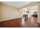 Bright dining area with hardwood floors and views into the living room at 1411 Ladora Dr, Charlotte, NC 28262