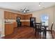 Kitchen boasts ample cabinetry, hardwood floors, and a breakfast nook at 1411 Ladora Dr, Charlotte, NC 28262