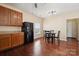 Eat-in kitchen with ample cabinet space and breakfast bar at 1411 Ladora Dr, Charlotte, NC 28262